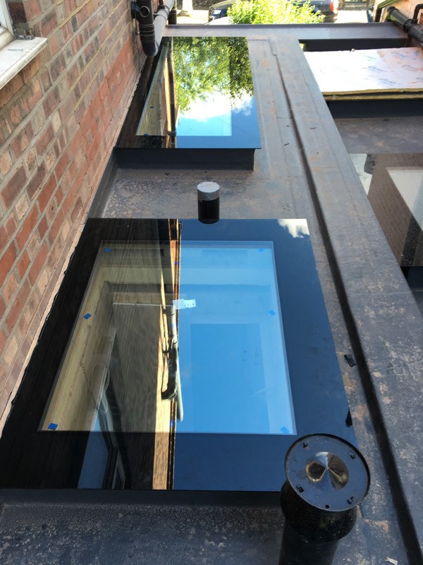 Multiple flat roof skylights on extension in Chiswick